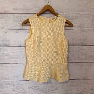 Club Monaco Swiss Dot Sleeveless Peplum Top in Sunshine Yellow.